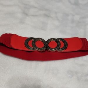 Chic Red Belt with Intricate Buckle